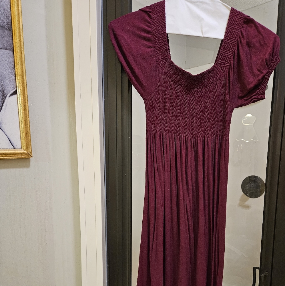 A burgundy dress 👗.